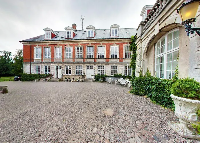 Hvedholm Slotshotel فندق 4*
